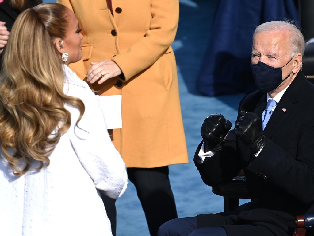 New President Joe Biden watches on as Jennifer Lopez performed at the 59th Inauguration ceremony. Picture: AFP