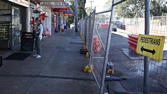 Work underway to change the footpath and parking spaces outside the the Skyline shopping centre at French's Forest. Picture: Adam Yip/Manly Daily