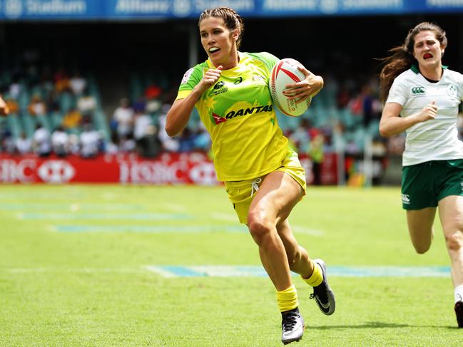 Australia's Charlotte Caslick scores a try during the Australia v Ireland World Rugby Sevens Series at Allianz Stadium, Sydney. Pic Brett Costello