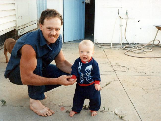 Fellows with his son during their time living on cattle stations. Photo: Supplied