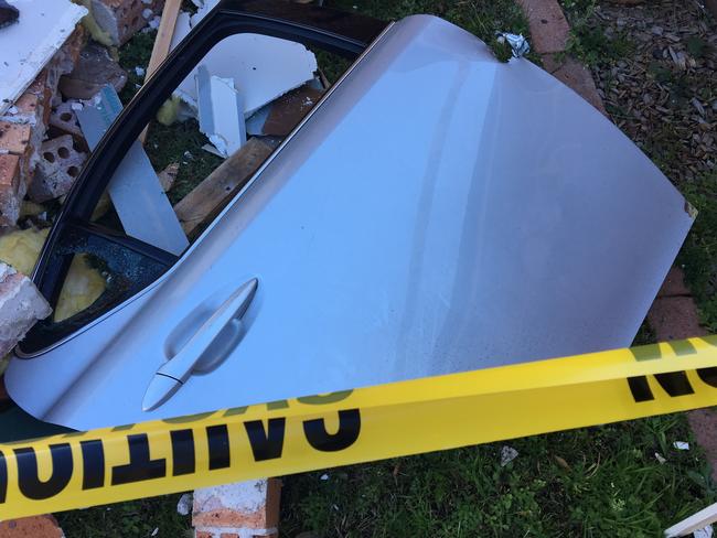 The door of the car which landed in the front bedroom of the Tynan's home.