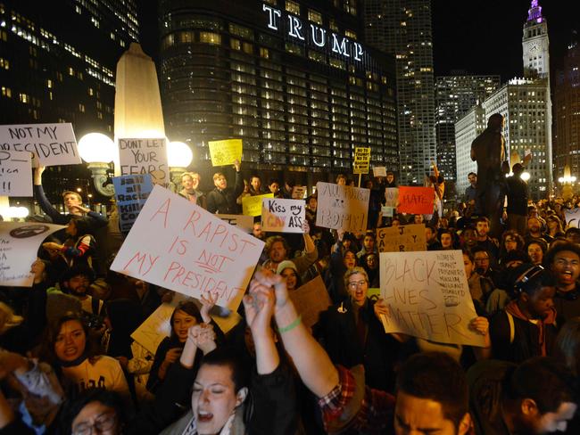 People take part in a protest against President-elect Donald Trump in Chicago, Illinois on November 9, 2016. Picture: AFP