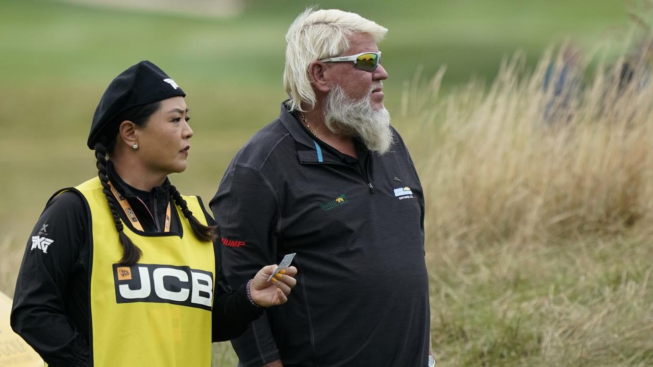 UTTOXETER, ENGLAND - JULY 30: John Daly of United States and his caddie Christina Kim in action during Day Two of The JCB Championship at JCB Golf &amp; Country Club on July 30, 2022 in Uttoxeter, England. (Photo by Phil Inglis/Getty Images)