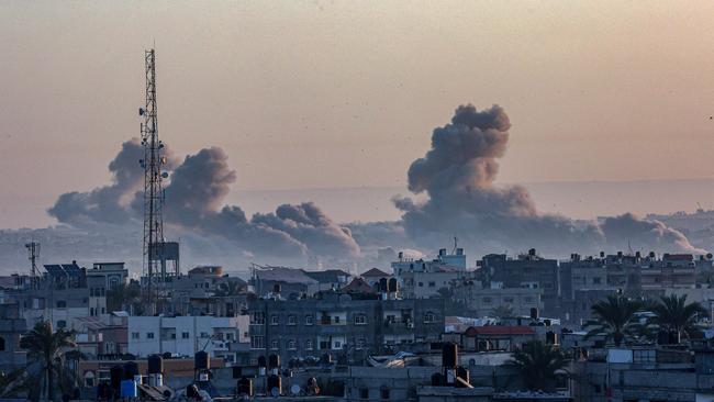 Smoke billowing over Khan Yunis in the southern Gaza Strip on Thursday. Picture: AFP