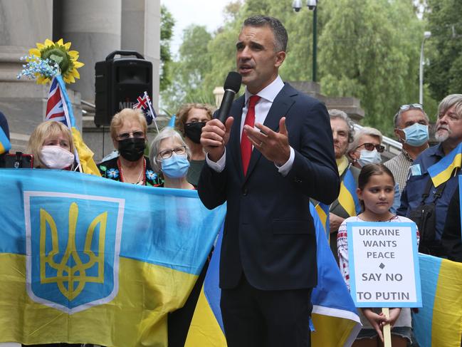 ADELAIDE, AUSTRALIA - Advertiser Photos FEBRUARY 20, 2022: SA MP Peter Malinauskas and Leader of the Opposition speaks with Ukrainian supporters at The Association of Ukrainians in South Australia rally in support of Ukraine on Sunday 20th February 2022 outside Parliament House, SA. Picture Emma Brasier