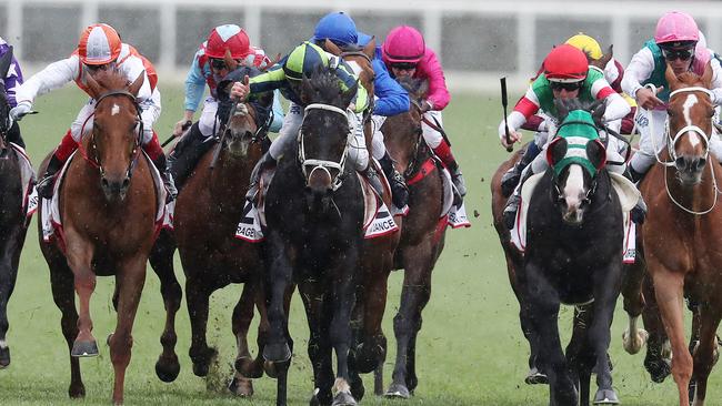 Mer De Glace (red cap) won the Caulfield Cup but O’Brien hopes Vow and Declare (orange and white quartered cap) can reverse that result. Pic: Micheal Klein