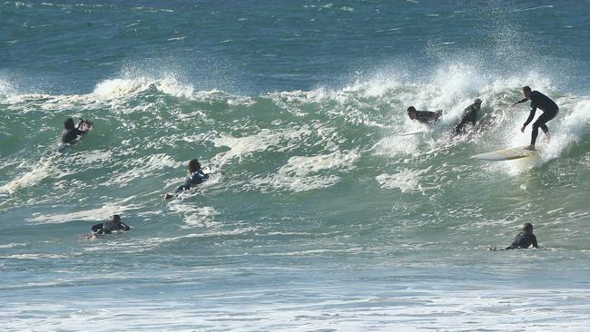 Surfers at Snapper Rocks. Picture: Mike Batterham