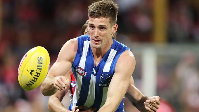 SYDNEY, AUSTRALIA - MAY 05: Shaun Atley of the Kangaroos handpasses the ball during the round seven AFL match between the Sydney Swans and the North Melbourne Kangaroos at Sydney Cricket Ground on May 5, 2018 in Sydney, Australia. (Photo by Mark Metcalfe/Getty Images)