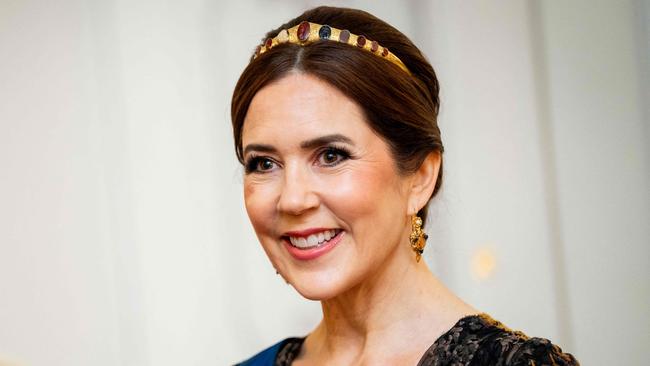 Queen Mary of Denmark smiles during a gala dinner at the Presidential Palace in Helsinki, Finland, on March 4, 2025 during a 2-day state visit of the Danish royal couple to Finland. (Photo by Ida Marie Odgaard / Ritzau Scanpix / AFP) / Denmark OUT