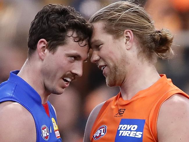 SYDNEY, AUSTRALIA - SEPTEMBER 07: Harry Himmelberg of the Giants remonstrates with Zaine Cordy of the Bulldogs during the 2019 AFL Second Elimination Final match between the GWS Giants and the Western Bulldogs at Giants Stadium on September 07, 2019 in Sydney, Australia. (Photo by Dylan Burns/AFL Photos via Getty Images)