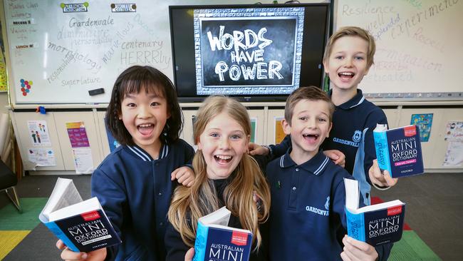 Year 3 and 5 Students Sylvia 9, Bryce 11, Jordan 9 and Ted 11 spell it out in class. Picture: David Caird