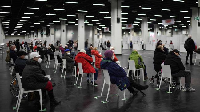 Elderly people wait at the coronavirus vaccination centre in Germany. Picture: AFP.