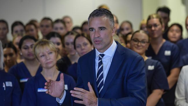 South Australian Peter Malinauskas with graduate nurses, who are among the winners in the rapid expansion of work in the non-market sector of health and social services. Picture: NCA NewsWire/ Roy VanDerVegt