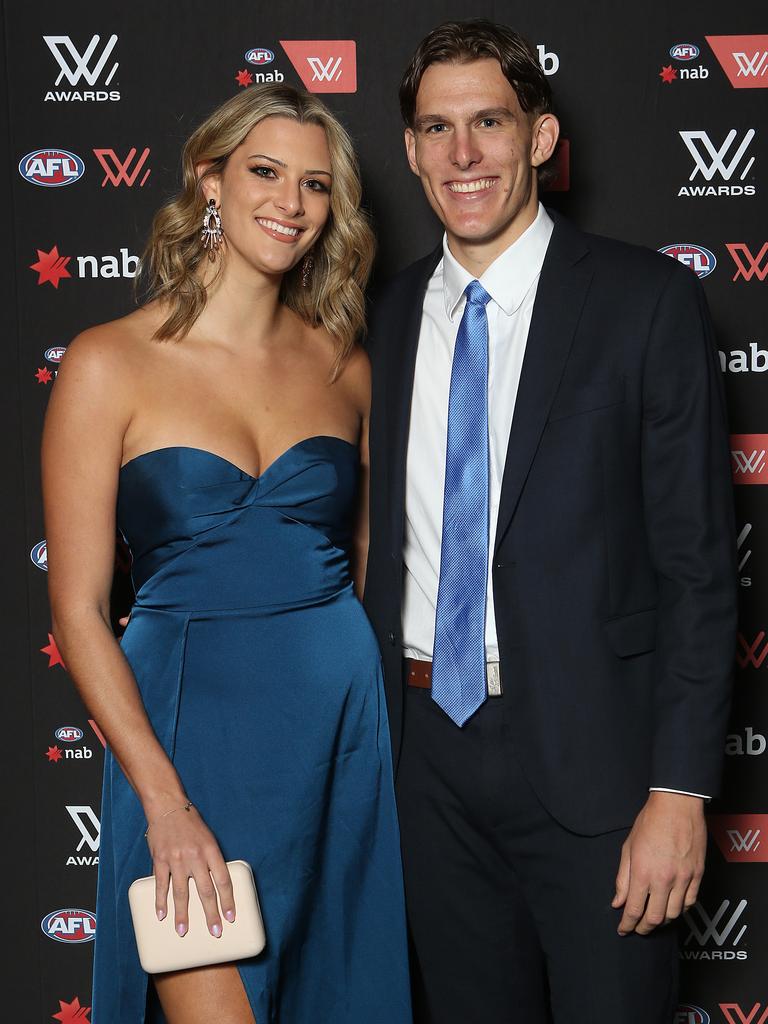 Lauren Bella of the Suns (left) poses for a photo with partner during the 2021 AFLW W Awards at The Gabba on April 20, 2021 in Brisbane, Australia. (Photo by Jono Searle/Getty Images)