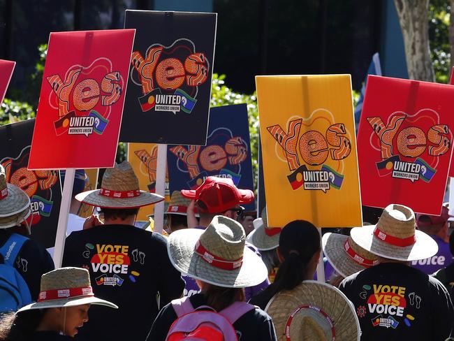 BRISBANE, AUSTRALIA - NewsWire Photos MAY 1, 2023: Members of the public carry Yes Vote signs during the Labor Day march in Brisbane. Picture: NCA NewsWire/Tertius Pickard