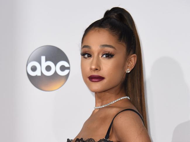 (FILES) This file photo taken on November 20, 2016, shows US singer Ariana Grande arriving for the 2016 American Music Awards in Los Angeles, California. British police said early May 23, 2017, that there were 