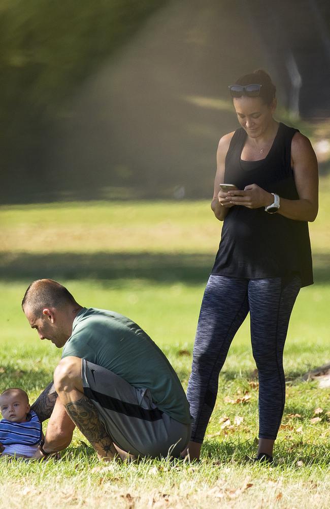 Mum and dad in the park with baby Axel.