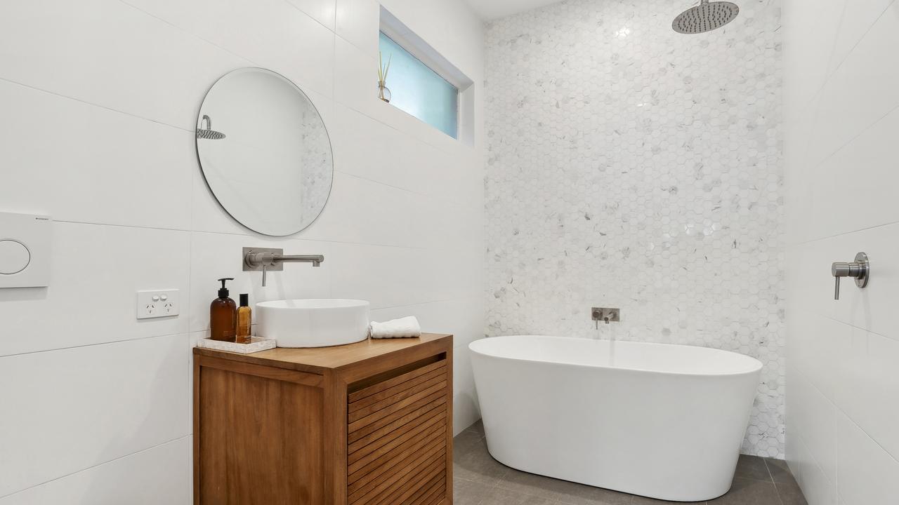 The bathroom benefited from a contemporary makeover.