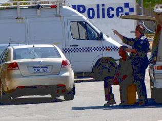Police forensic squad officers at the crime scene. Photo: PerthNow
