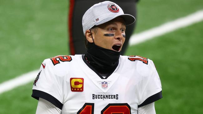 DETROIT, MICHIGAN - DECEMBER 26: Tom Brady #12 of the Tampa Bay Buccaneers reacts during the third quarter of a game against the Detroit Lions at Ford Field on December 26, 2020 in Detroit, Michigan.   Rey Del Rio/Getty Images/AFP == FOR NEWSPAPERS, INTERNET, TELCOS & TELEVISION USE ONLY ==