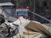 Man dies in wild storms, homes lost, fireys hurt in Grampians blazes