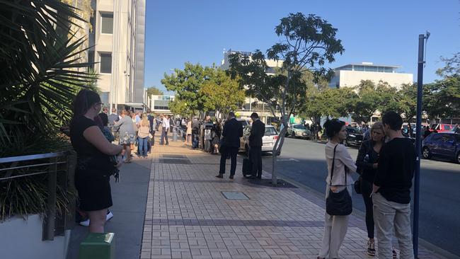 Crowds gathered outside Southport Courthouse after the building was closed by a smashed window overnight.