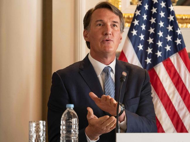 Virginia Governor Glenn Youngkin attends a press conference with US Ambassador to Japan Rahm Emanuel and Micron Technology Executive Vice President Manish Bhatia at the ambassadorâs residence in Tokyo on April 27, 2023. (Photo by Yuichi YAMAZAKI / AFP)