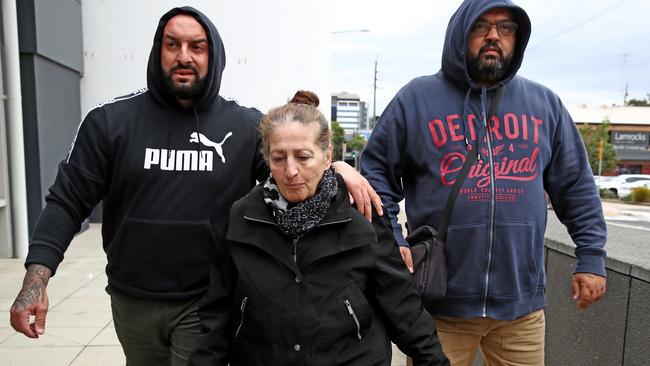 Assie leaves Penrith Local Court escorted by family. Picture: Toby Zerna