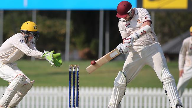 Tea Tree Gully's Brad Evans in action on his way to 45 against Glenelg on Saturday. The Bulls are in control against the Seahorses, who are battling for finals. Picture: AAP/Dean Martin