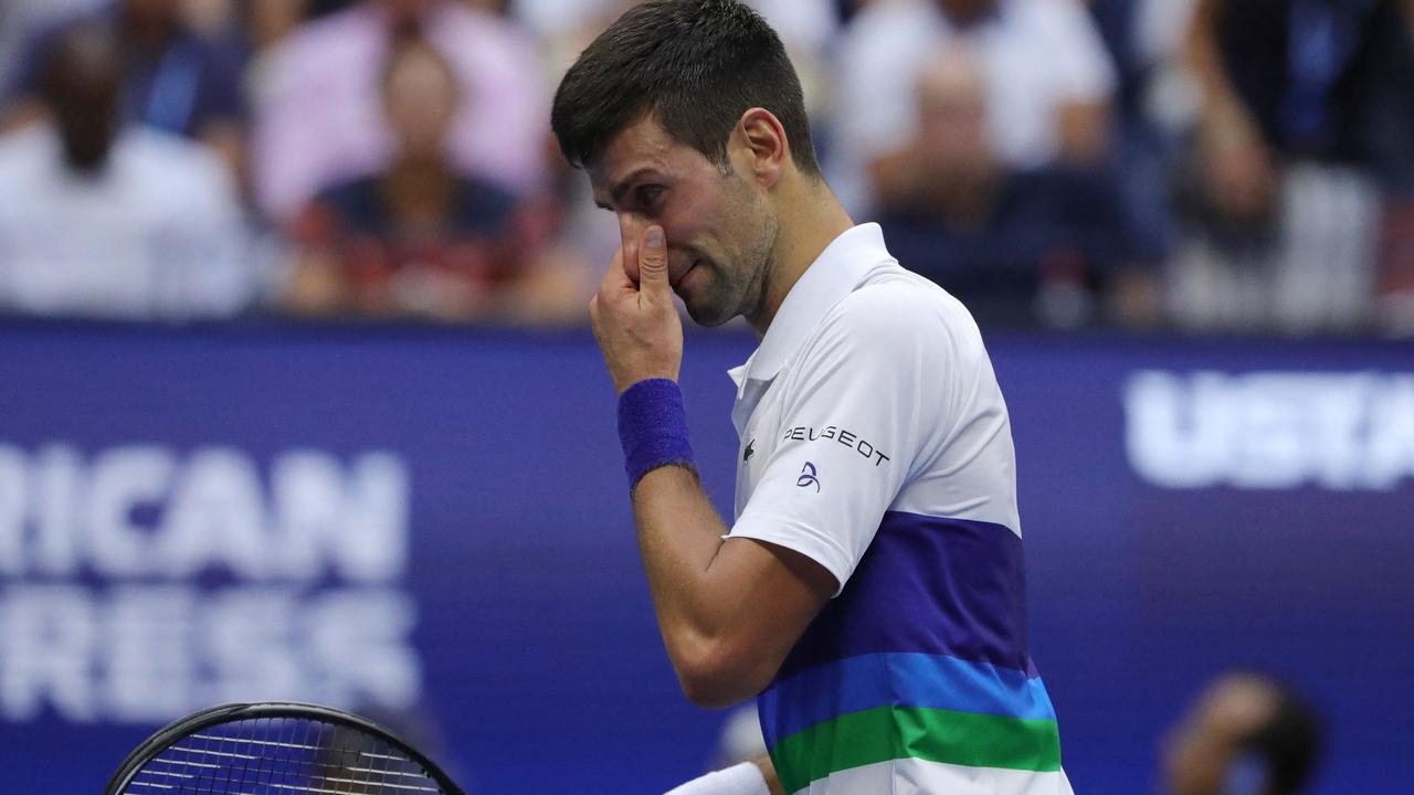 Novak Djokovic was still wiping away tears on the next point. Photo by Kena Betancur / AFP)