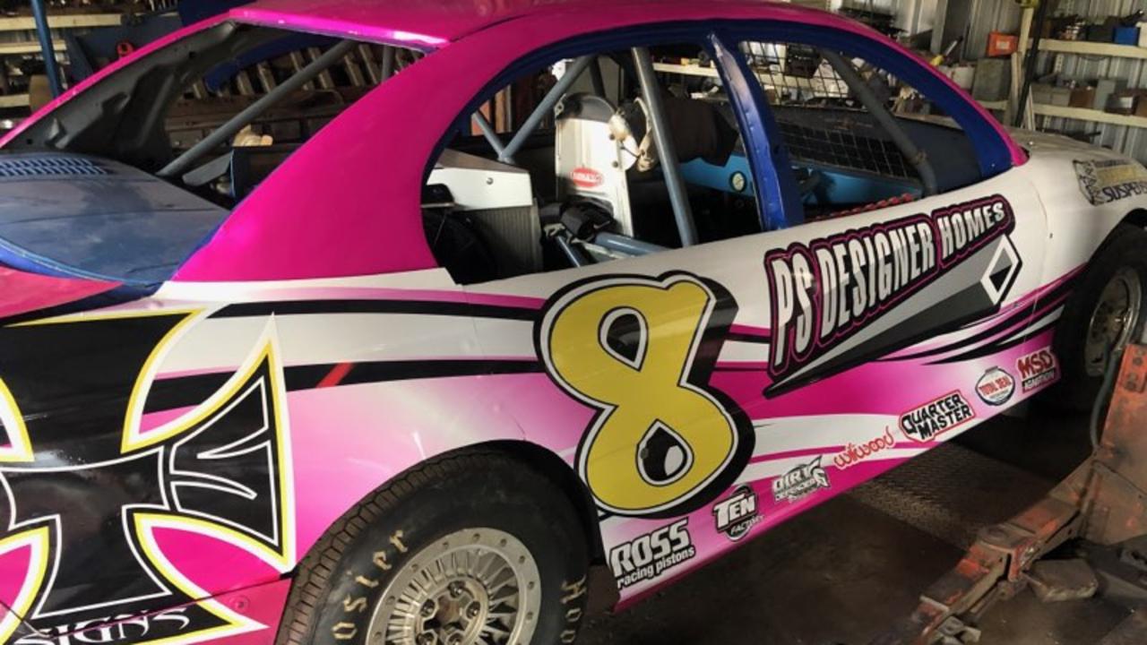 Rodney Pammenter's freshly painted Modified Sedan being prepared for Saturday's Pink Night fund-raiser at Toowoomba Speedway.