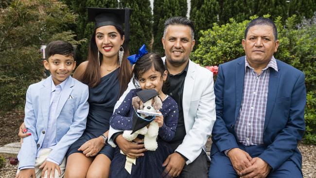 Bachelor of Nursing graduate Laxmi Pandey with family (from left) Riwaj Pandey, Aahana Pandey, Sujan Pandey and Dharma Timilsina at a UniSQ graduation ceremony at Empire Theatres, Tuesday, February 13, 2024. Picture: Kevin Farmer