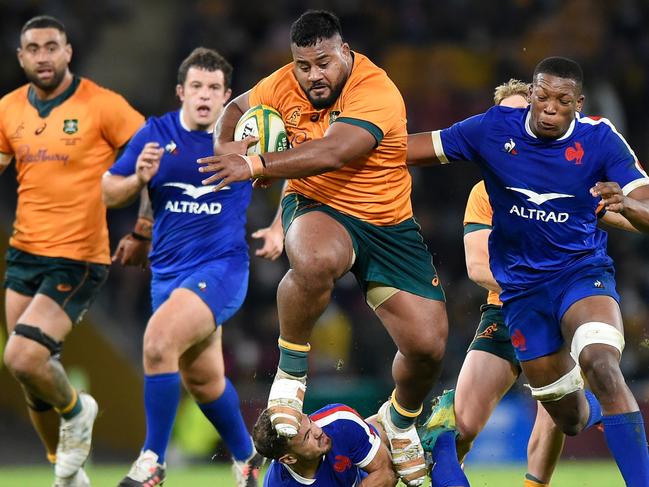 BRISBANE, AUSTRALIA - JULY 07: Taniela Tupou of the Wallabies takes on the defence during the international Test match between the Australia Wallabies and France at Suncorp Stadium on July 07, 2021 in Brisbane, Australia. (Photo by Matt Roberts/Getty Images for Rugby Australia)