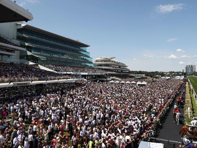 MELBOURNE , AUSTRALIA. November 7, 2023.  Melbourne Cup races at Flemington Racecourse, Melbourne.  Race 7. The Melbourne Cup.    The field heads out for the Melbourne cup infront of huge crowd at Flemington     . Pic: Michael Klein