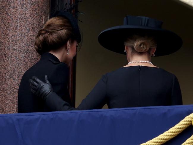 The Duchess of Edinburgh places her hand on Princess Catherine’s back as they depart the balcony after the National Service of Remembrance. Picture: Chris Jackson/Getty Images