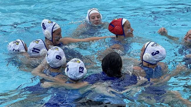 The North Brisbane 18Bs celebrate their grand final win.