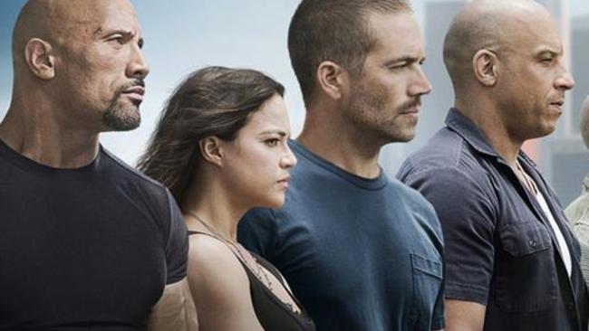 Late actor Paul Walker (second from right) is among the actors in the newly-released Fast & Furious 7 poster.