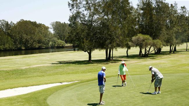 Golfers at Marrickville Golf Course. Picture: John Appleyard