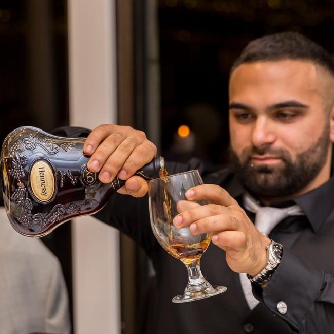 Sayet Erhan Akca pouring Hennessy. Picture: Facebook