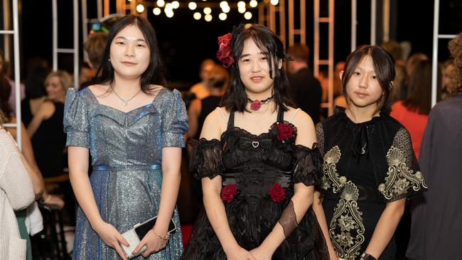 Lucy Lu, Chengcheng Liu and Cheryl Qian at the year 12 St Hilda formal. Photo: Celeste Humphrey