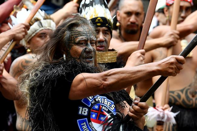 Members of the Maori community march through the streets in a protest rally to criticise the government for its policies affecting the Indigenous Māori population in Wellington on November 19, 2024.  Thousands of people participated in the nine day protest march organised by the national movement Te hīkoi mō te Tīriti (March for the Treaty) against Act’s Treaty Principles Bill plan to end after holding a rally in the Parliament ground.