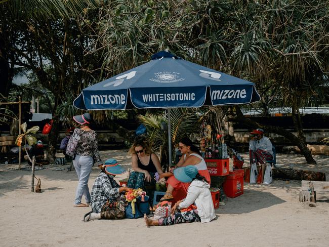 There are plenty of signs of life on the beach stretching between Kuta and Legian which was near deserted when COVID hit a year ago.