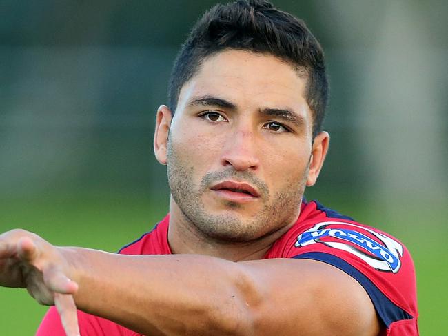 CAIRNS, AUSTRALIA - JANUARY 30: Anthony Faingaa passes during a Queensland Reds Super Rugby training session on January 30, 2015 in Cairns, Australia. (Photo by Chris Hyde/Getty Images)