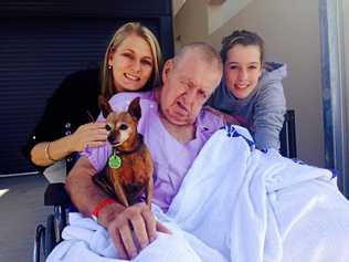 HIS CHOICE: Barry Langbecker with his daughter Denise Kapernick, granddaughter Emily and his dog Bonn. This was the last day Barry was able to be wheeled outside as he wasn't able to be hoisted into his wheelchair again because his pain levels were unmanageable. Eventually, even cutting his fingernails brought him to tears.