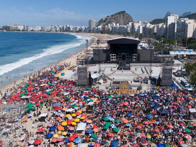 In this aerial view fans of US singer Lady Gaga wait hours before the beginning of her mega-concert at Copacabana Beach in Rio de Janeiro, Brazil. Picture: AFP