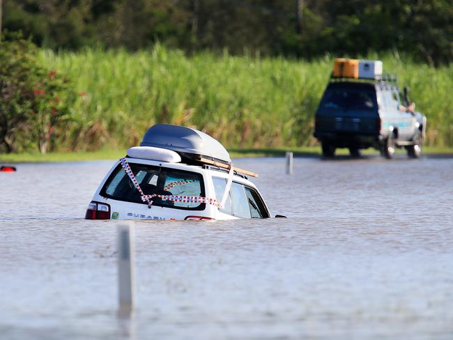 A man and women from Nimbin needed rescuing by Murwillumbah SES Flood Rescue Officers early this morning when they drove through the heavily flooded Tweed Valley Way disobeying Road Closed signs.Photo Scott Powick Daily News