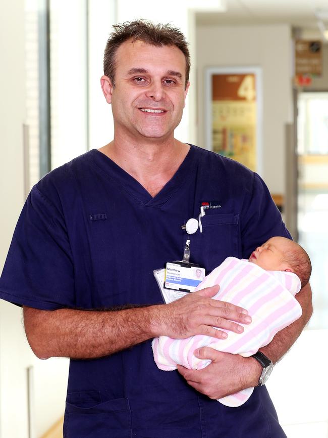 Matthew Thompson with baby Vanessa Nguyen. Picture: Tim Hunter.