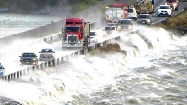 Wild weather hits Tasmania with morning drivers battling harsh conditions at the causeway at Midway Point. Picture: Facebook