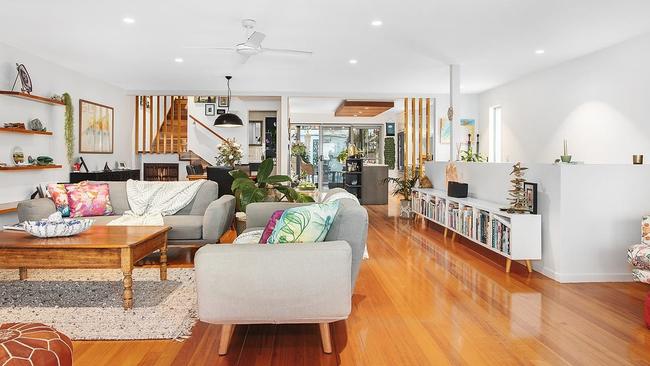 The property also boasts free-flowing open plan living with raised ceilings and timber floors throughout. Picture: Contributed