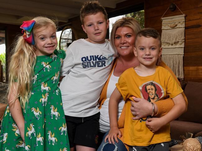 Pippa, 6, Ned, 4, with mum Kendra and older brother Max at their Langwarrin home. Picture: PENNY STEPHENS